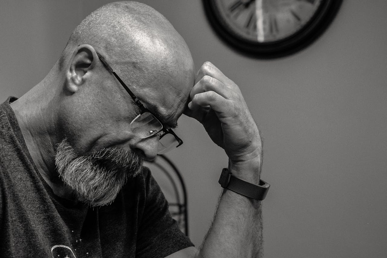 Photo by Brett Sayles: https://www.pexels.com/photo/grayscale-photo-of-man-thinking-in-front-of-analog-wall-clock-1194196/